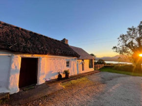 Private Thatched Cottage - with views